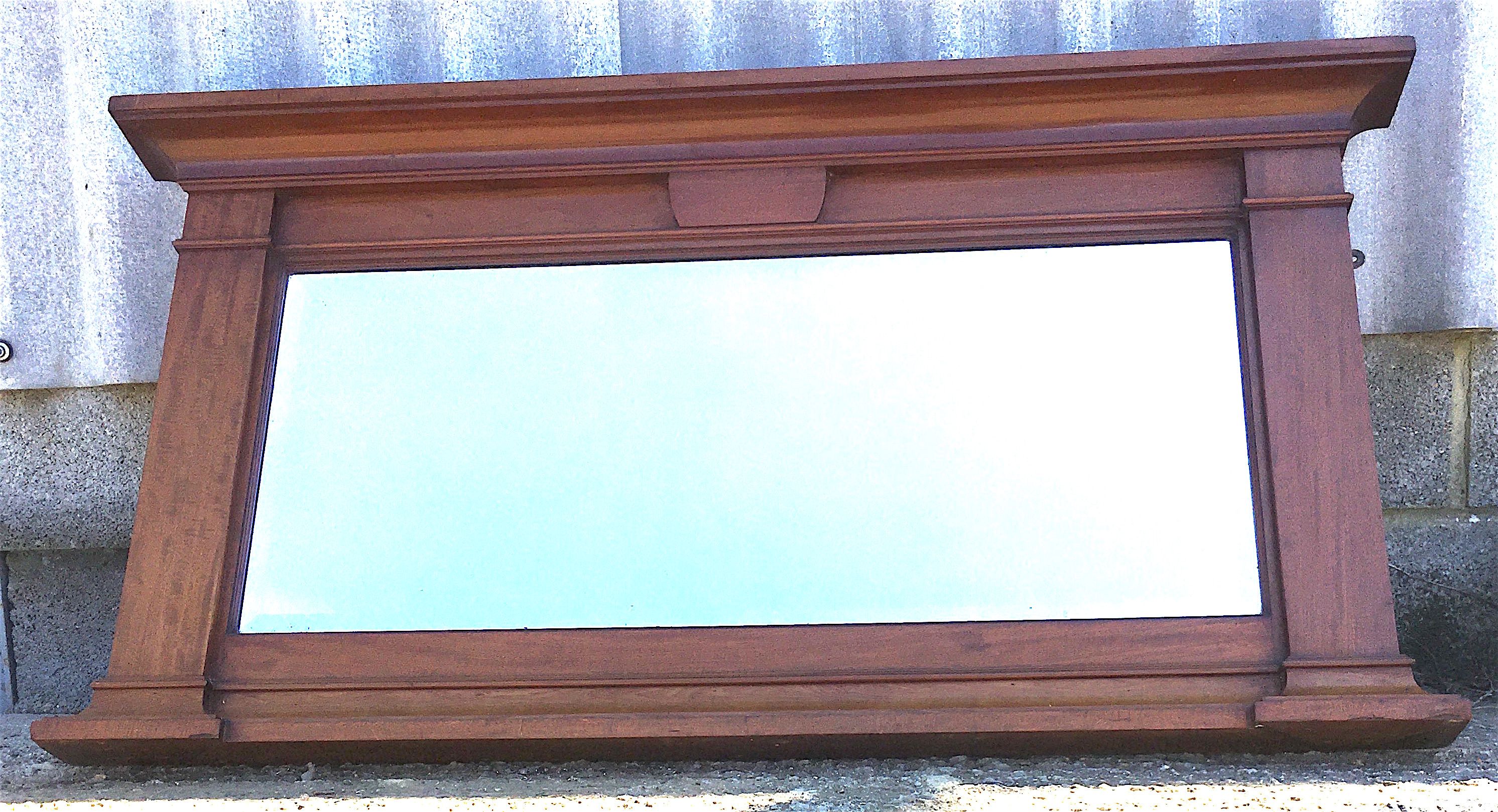 An early 20th century mahogany overmantel mirror, width 144cm, height 77cm